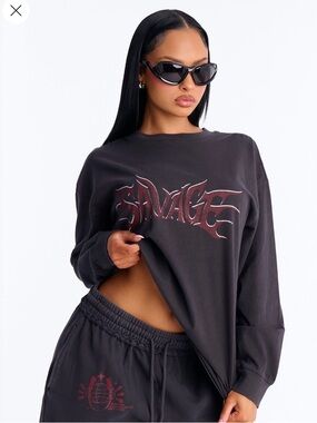 Fashion Nova Black Long-Sleeve "SAVAGE" Graphic Top with Red Accent